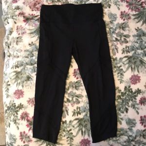 Black Lululemon capris leggings with mesh design